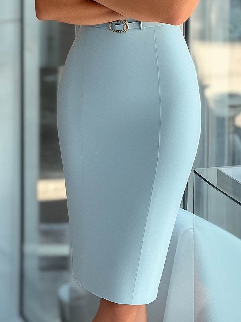 Sky blue asymmetrical FJØRNA dress with belt, stylish women's dress featuring a modern silhouette and elegant design.