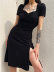 FJØRNA dark academia white midi dress with leg split, featuring a classic, elegant design and flowing fabric.