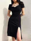 FJØRNA dark academia white midi dress with leg split and midi length, styled for a sophisticated, vintage-inspired look.