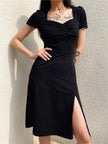 FJØRNA dark academia white midi dress with leg split, elegant and flowy, perfect for stylish, sophisticated occasions.