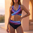Dark blue FJØRNA fitted striped wrap front bikini set for women, showcasing the stylish swimwear design with bold stripes.