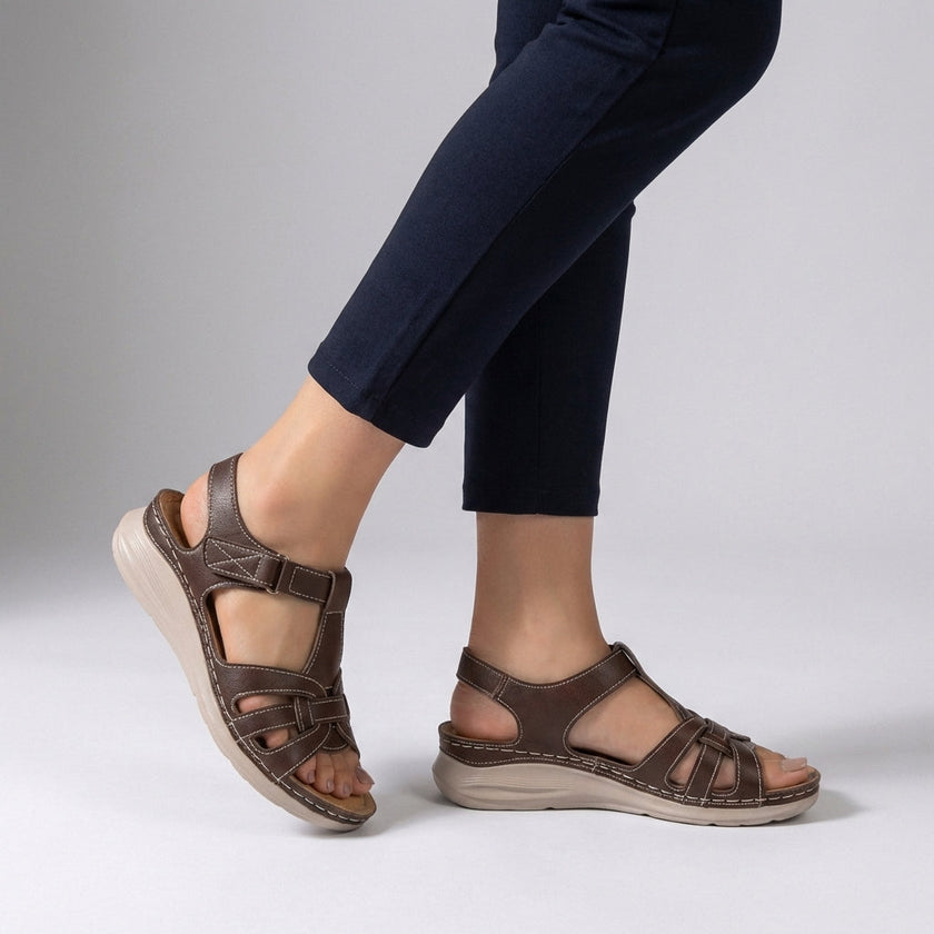 Dark khaki FJØRNA orthopedic open toe wedge sandals with cross-strap stitching, featuring supportive design and stylish comfort.