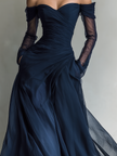 Dark blue chiffon maxi dress by FJØRNA, flowing evening dress with elegant long skirt and delicate fabric details.