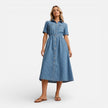 FJØRNA women's denim shirt dress with midi length, button front, casual style, perfect for comfortable everyday wear.
