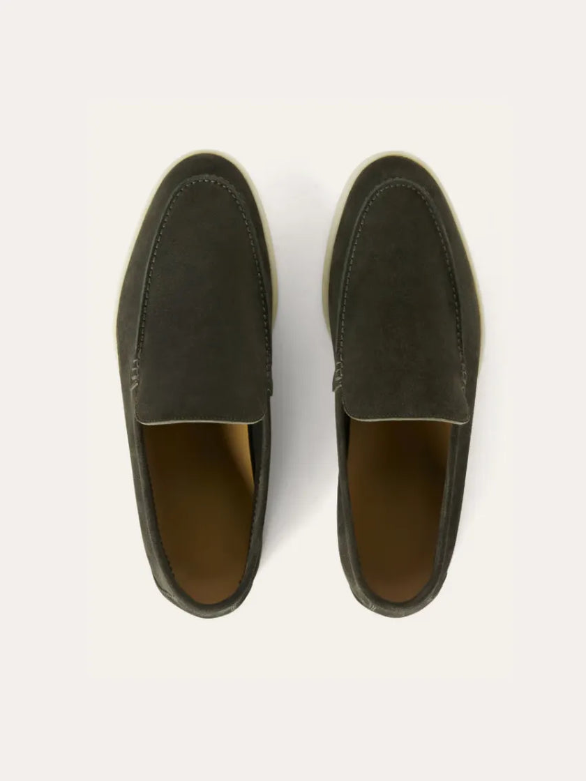 Men's dark green suede moccasin slippers by FJØRNA, featuring a soft suede upper and comfortable slip-on design.