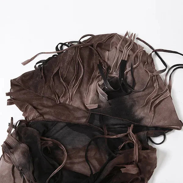 FJØRNA distressed sheer maxi dress with a flowing design and distressed fabric, perfect for a stylish, airy summer look.