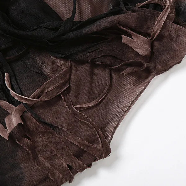 FJØRNA distressed sheer maxi dress featuring a flowy silhouette and distressed detailing, perfect for boho-inspired looks.