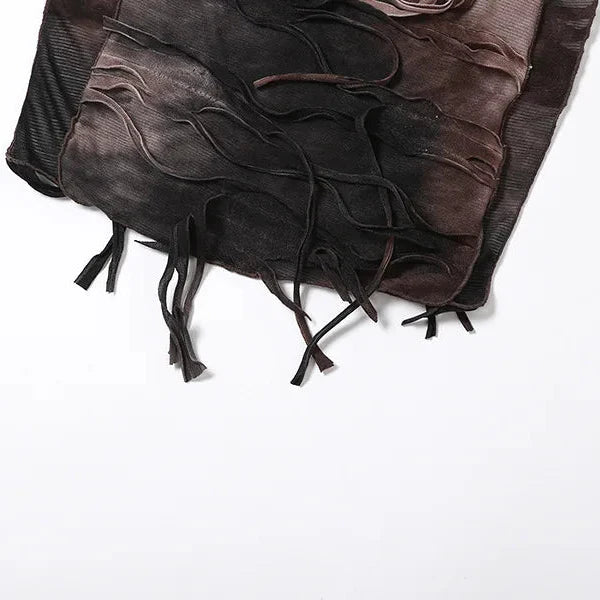 FJØRNA distressed sheer maxi dress featuring a flowy silhouette and distressed details, perfect for elegant summer wear.