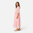 Women's lightweight floral summer midi dress by FJØRNA featuring bohemian style and flowing fabric, perfect for warm weather.
