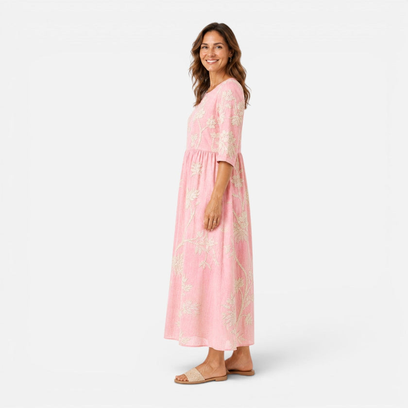 Women's lightweight floral summer midi dress by FJØRNA featuring bohemian style and flowing fabric, perfect for warm weather.