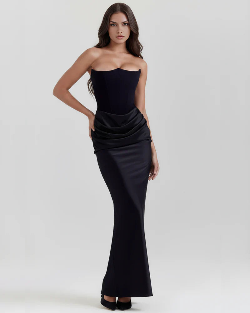 Velvet women's strapless corset maxi dress with ruched detail by FJØRNA, elegant and fitted for formal occasions.