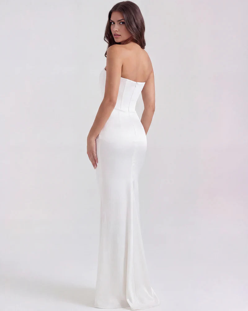 Women's velvet strapless corset maxi dress with ruched detail by FJØRNA, shown on a model.