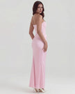 Velvet women's strapless corset maxi dress with ruched detail by FJØRNA, showing a fitted bodice and flowing skirt.