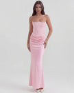 Velvet women's strapless corset maxi dress with ruched detail by FJØRNA, showing a fitted bodice and flowing skirt in the image.