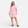 FJØRNA women's linen shirt dress with pockets, casual summer dress in light fabric, showing a relaxed fit and front pockets.