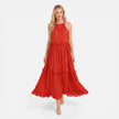 Lightweight women's tiered maxi dress by FJØRNA with a flowy silhouette and halter neck, ideal for summer wear.