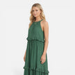 Lightweight women's tiered maxi dress by FJØRNA featuring a flowy design and halter neck, perfect for summer wear.