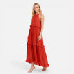 Lightweight, flowy women's tiered maxi dress with halter neck by FJØRNA, perfect for summer wear.