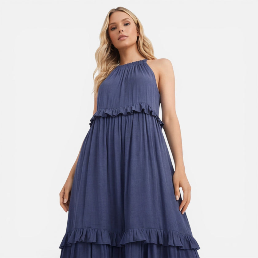 Lightweight women's tiered maxi dress by FJØRNA featuring a flowy summer design and halter neck style.