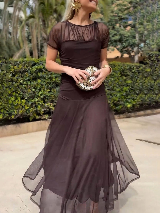 Elegant mesh pleated wide-leg maxi dress for women by FJØRNA, featuring a hip-hugging fit and flowing design.
