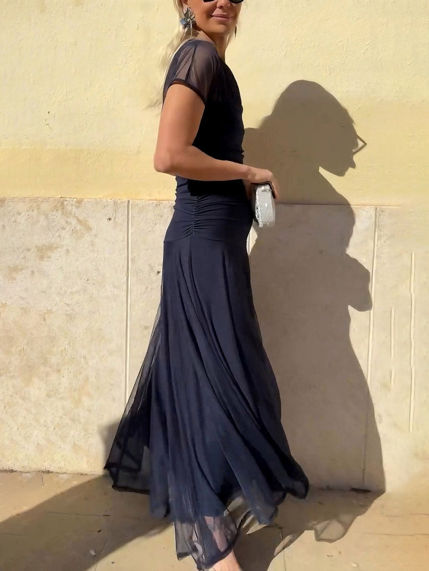 FJØRNA elegant mesh pleated wide-leg maxi dress with hip-hugging fit, perfect for stylish women.