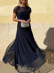 FJØRNA elegant mesh pleated wide-leg maxi dress for women, hip-hugging design with a flowing, stylish silhouette.
