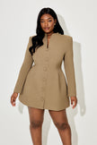 Women's khaki button-down mini dress by FJØRNA with long sleeves, casual elegant style, shown on a model.