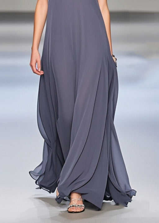 Elegant grey sleeveless chiffon long dress with extra large hem draping by FJØRNA, perfect for formal occasions.