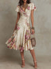 Elegant vintage floral satin midi dress for women by FJØRNA, featuring a flowing chiffon fabric and classic day-to-night style.
