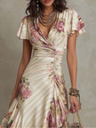 Elegant vintage floral satin women's midi dress by FJØRNA featuring a flowing chiffon fabric and classic day-to-night style.