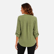 Women's green V-neck long sleeve blouse by FJØRNA, elegant and casual top with a stylish fit and comfortable fabric.