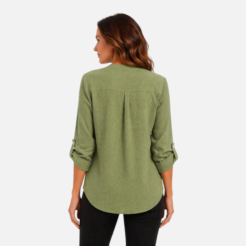 Women's green V-neck long sleeve blouse by FJØRNA, elegant and casual top with a stylish fit and comfortable fabric.