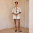FJØRNA linen blend co-ord set for women, featuring a stylish top and matching pants in a casual, breathable fabric.