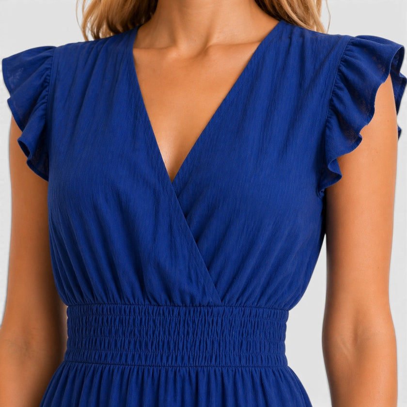 Women's FJØRNA cotton wrap midi dress with elegant design, perfect for comfortable summer wear.