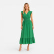 Women's FJØRNA cotton wrap midi dress with elegant, comfortable design, perfect for summer occasions.
