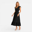 Elegant women's FJØRNA cotton wrap midi dress, comfortable summer dress with a stylish design and flattering fit.