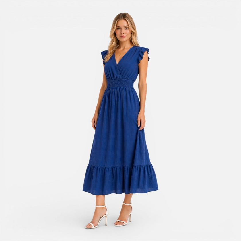 Elegant women's FJØRNA cotton wrap midi dress, perfect for summer, showcasing a comfortable and stylish design.