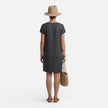 Women's FJØRNA lightweight relaxed fit dress with breathable fabric and pockets, perfect for casual wear.