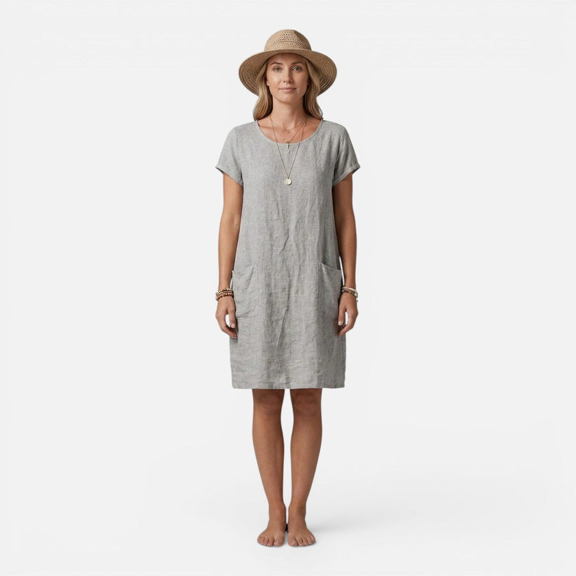 Women's lightweight, relaxed fit FJØRNA dress with breathable fabric and practical pockets, perfect for casual wear.