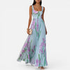 Women's floral elegant maxi dress by FJØRNA with a flowy silhouette and pockets, perfect for summer or special occasions.