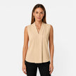 Women's sleeveless blouse by FJØRNA featuring an elegant draped fit and V-neck design, perfect for a timeless and stylish look.