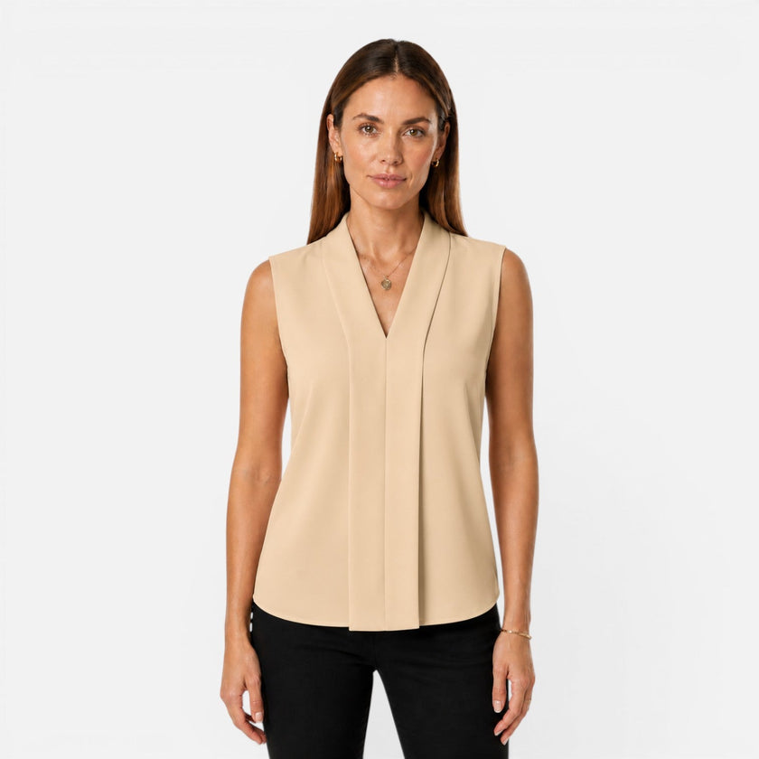 Women's sleeveless blouse by FJØRNA featuring an elegant draped fit and V-neck design, perfect for a timeless and stylish look.