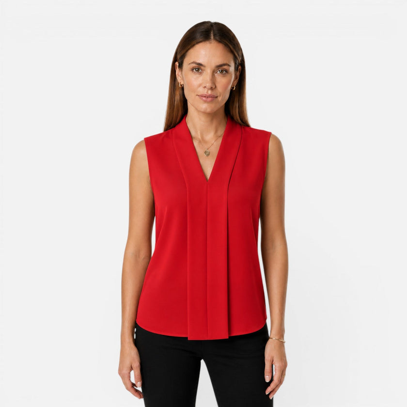 Elegant women's sleeveless blouse by FJØRNA featuring a draped V-neck and timeless fit, ideal for stylish summer outfits.