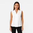 Women's sleeveless blouse by FJØRNA featuring an elegant draped V-neck and timeless fit, perfect for stylish casual or formal wear.