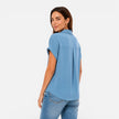 Women's lightweight V-neck short sleeve blouse by FJØRNA, relaxed fit, casual top for warm weather, shown in a natural fabric.