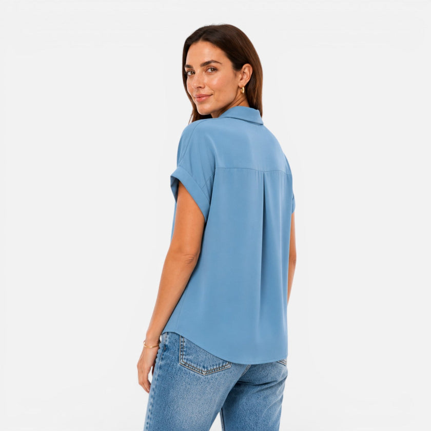 Women's lightweight V-neck short sleeve blouse by FJØRNA, relaxed fit, casual top for warm weather, shown in a natural fabric.