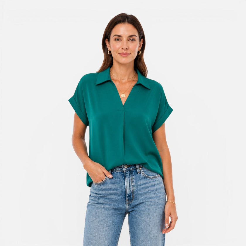 FJØRNA women's V-neck short sleeve blouse with relaxed fit, lightweight fabric, styled as a casual and comfortable women's shirt.