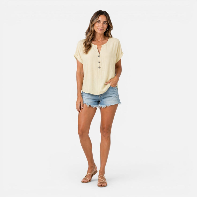Women's lightweight V-neck T-shirt by FJØRNA featuring buttons and a relaxed fit, perfect for summer wear.
