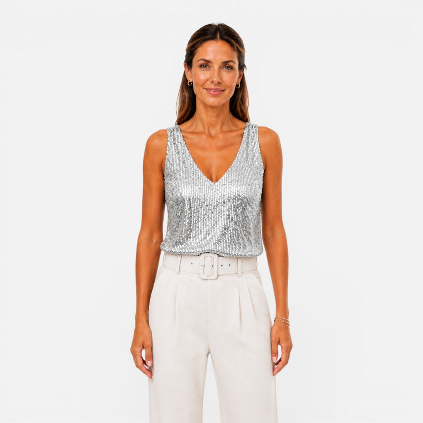 Women's sequin V-neck top by FJØRNA, stylish evening wear shirt with shimmering sequins and a flattering V-neck design.