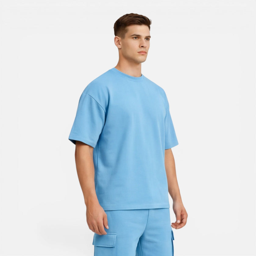 Men's casual summer set by FJØRNA with matching T-shirt and cargo shorts, perfect for relaxed warm-weather wear.